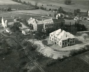Aerial black and white photo of school buildings in Mount Calvary, Wisconsin