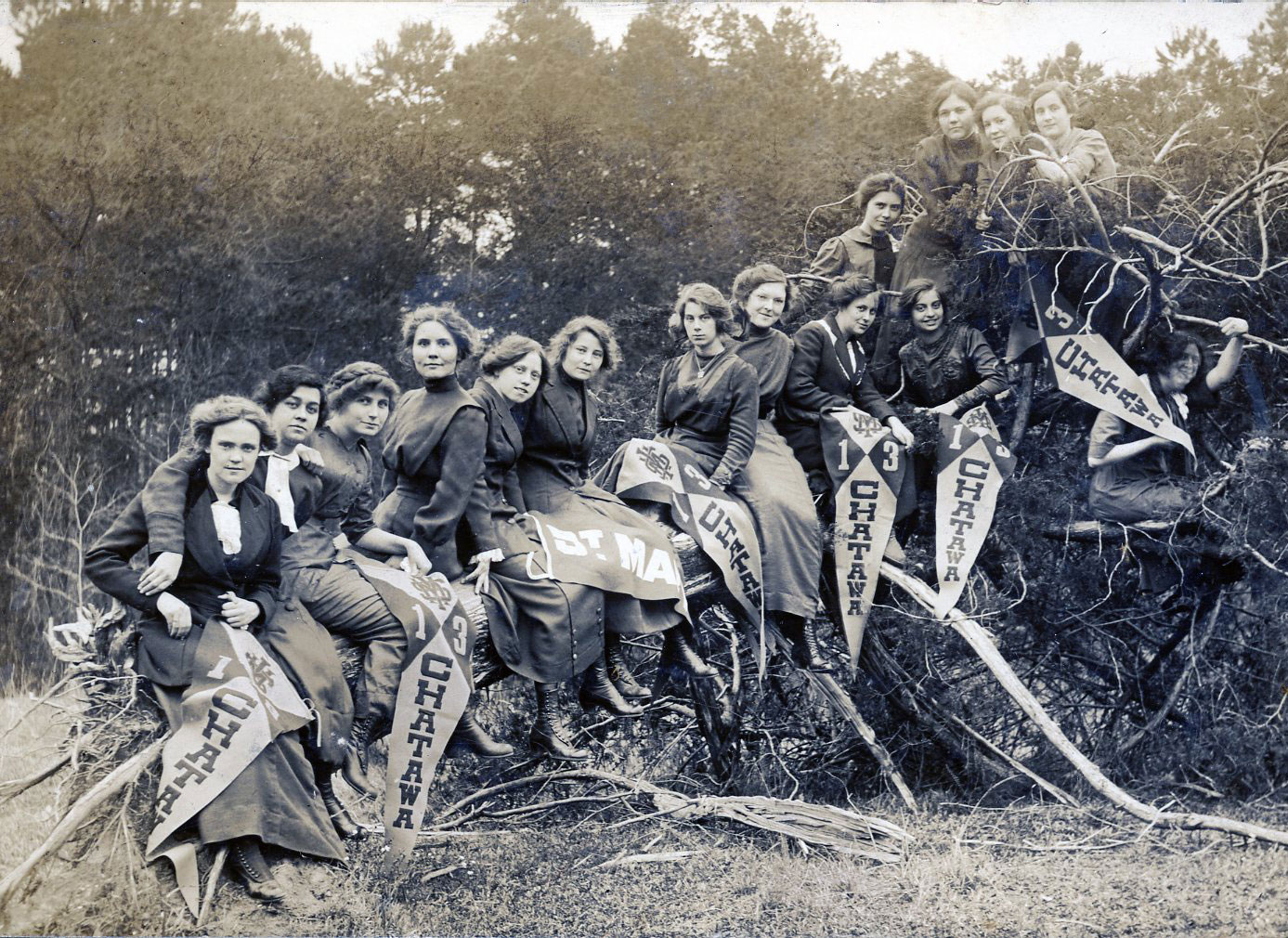 Archival photo of students holding pennants at Saint Mary of the Pines Academy in Chatawa, Mississippi. 
