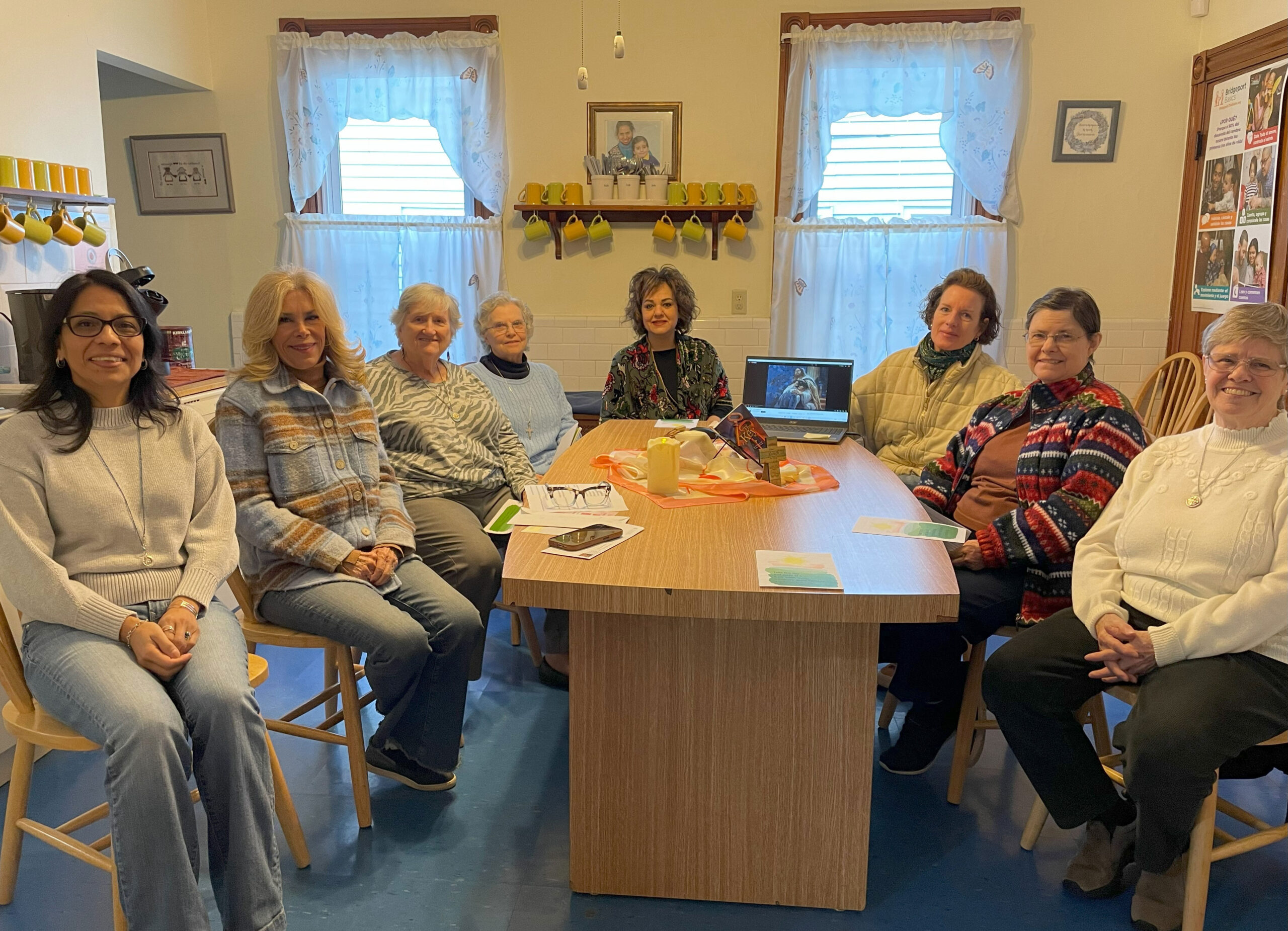 Staff members at Caroline House gather for reflection.