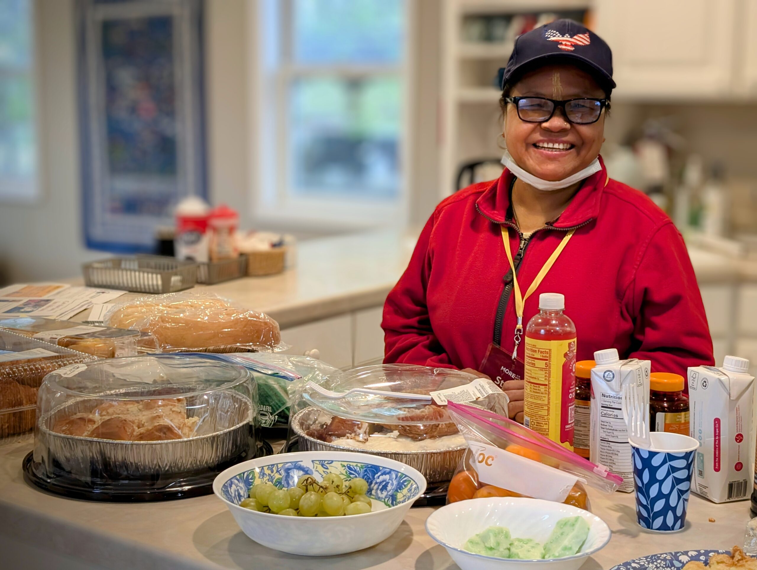 Babita Sapkota, who serves as MORE’s basic needs coordinator and office assistant, provides snacks for students.